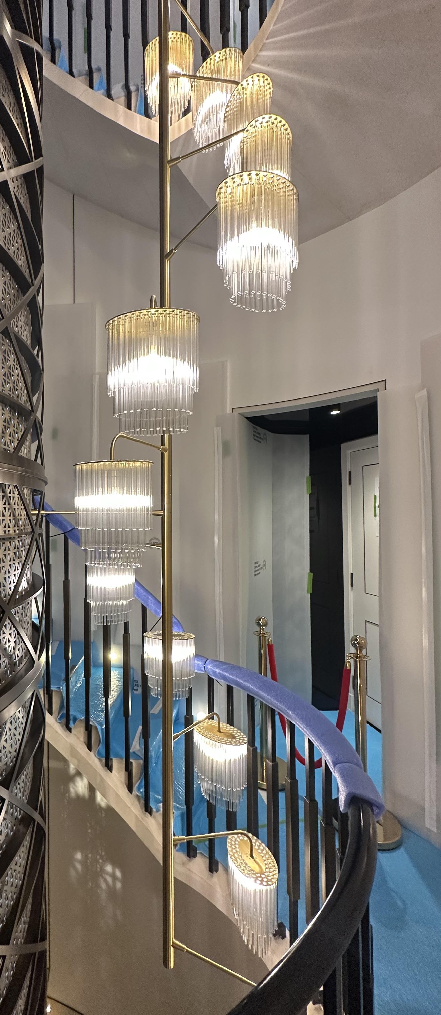 A contemporary stairwell chandelier by Baroncelli